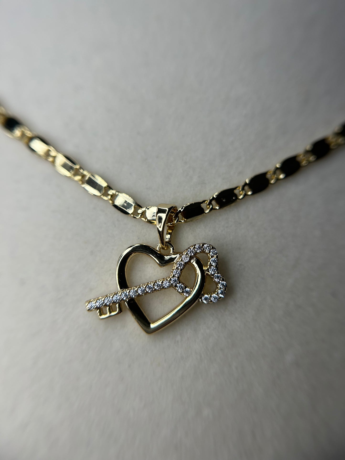 Necklace with heart and key pendant