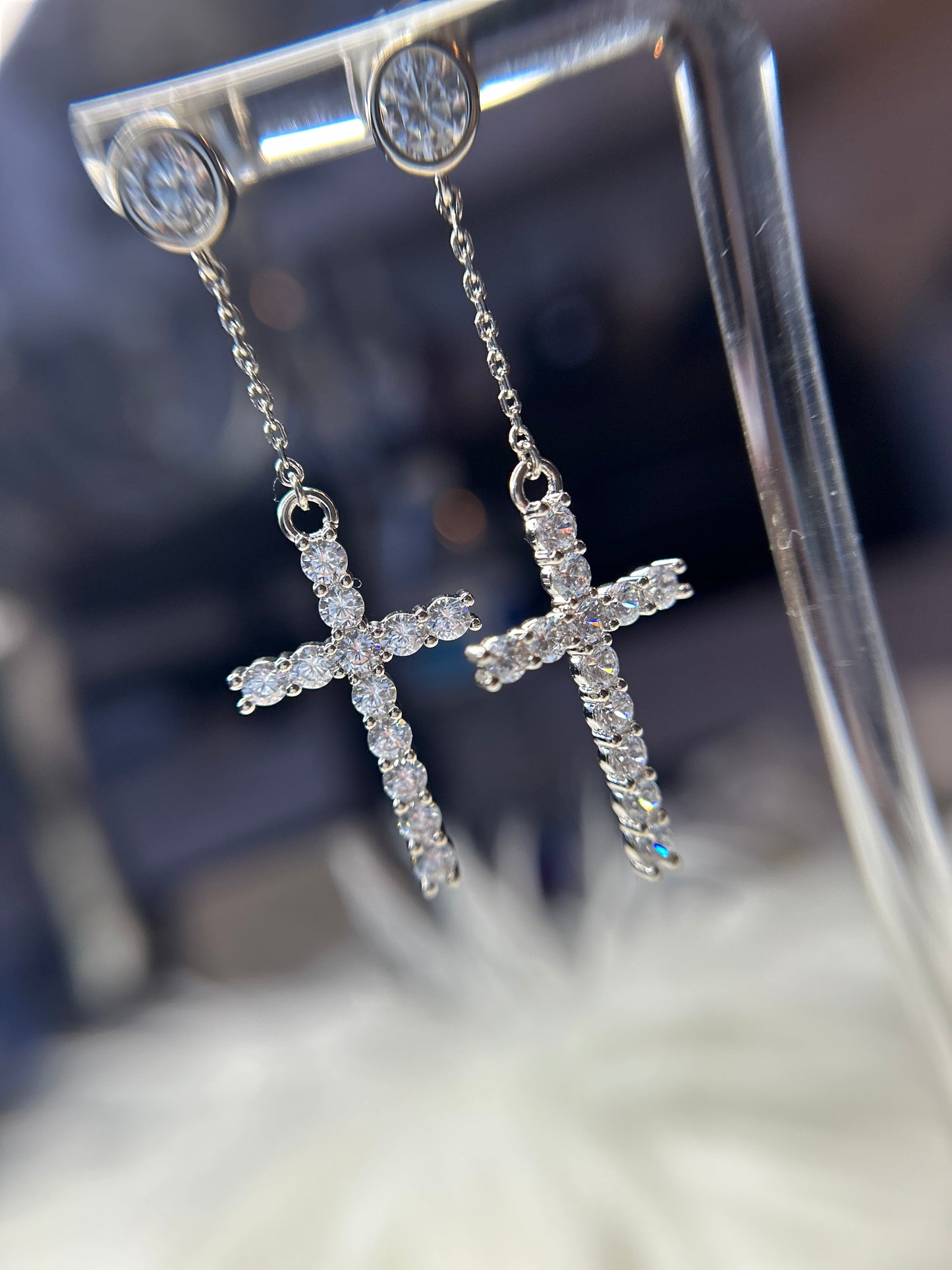 Cross dangling earrings
