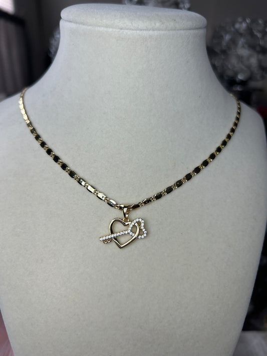 Necklace with heart and key pendant