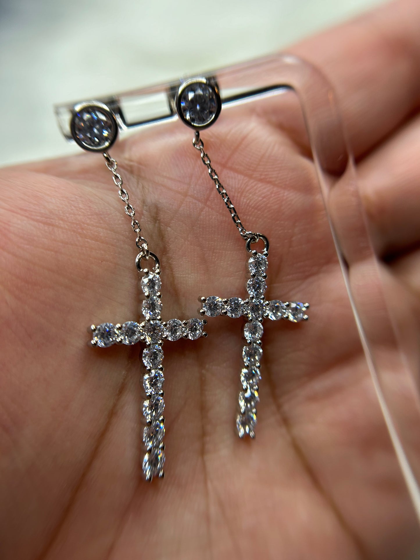 Cross dangling earrings
