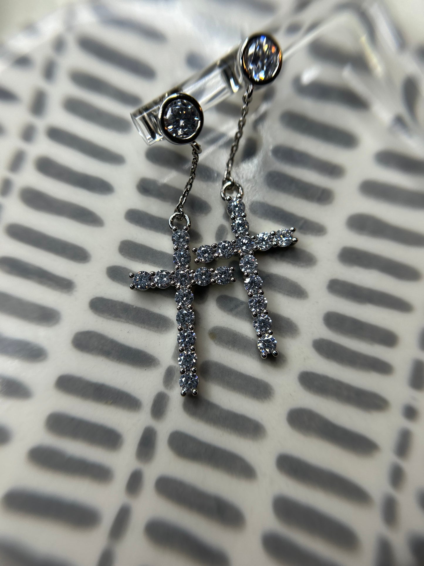 Cross dangling earrings