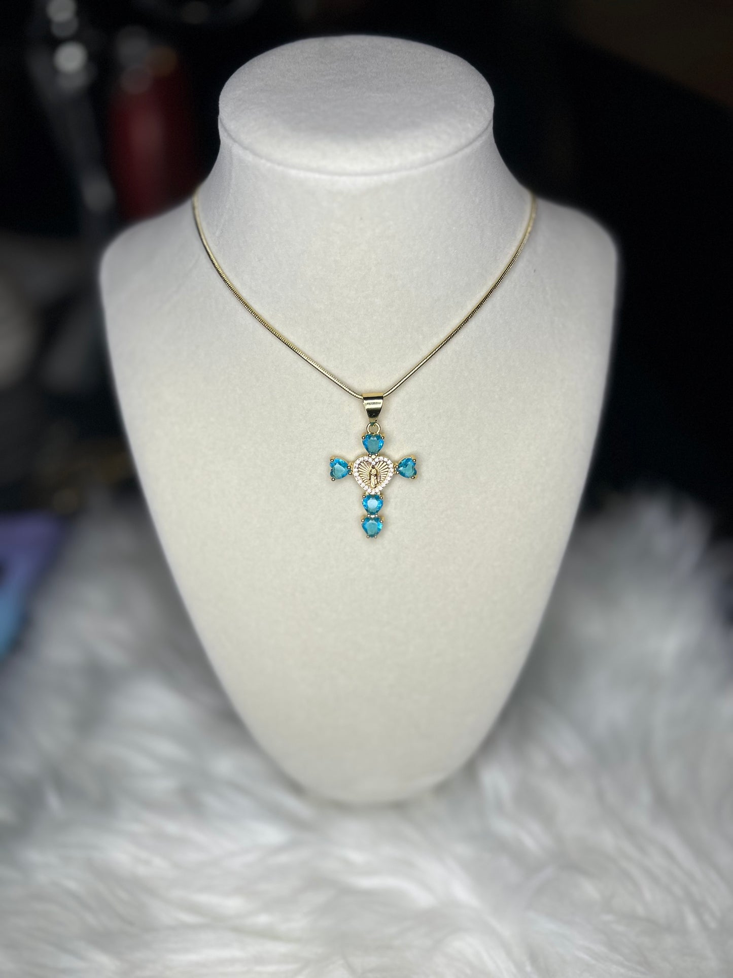 Teal heart cross