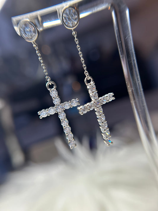 Cross dangling earrings