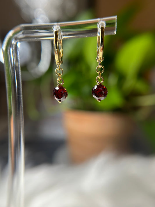 Dangling ruby earrings