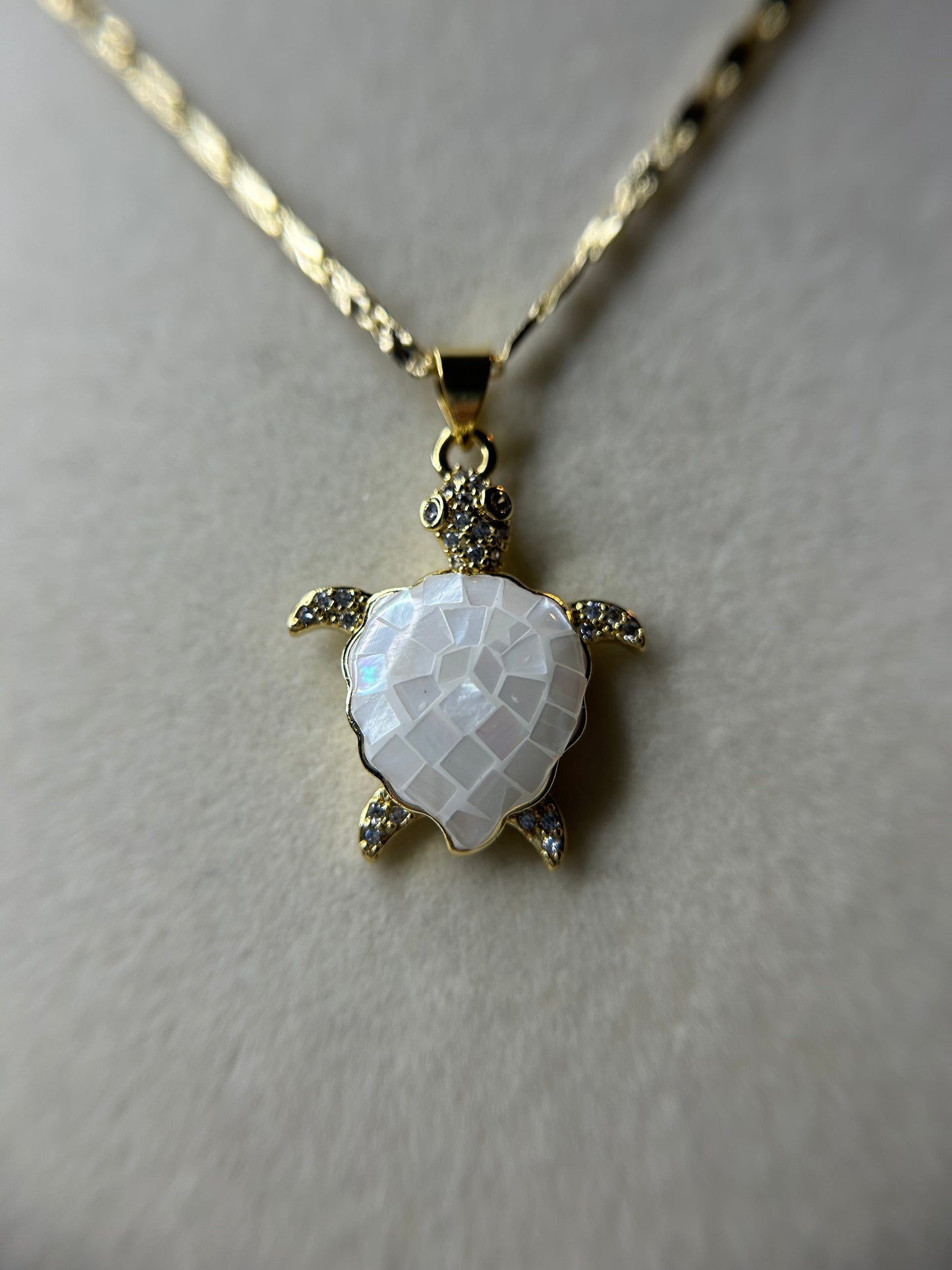 White turtle necklace