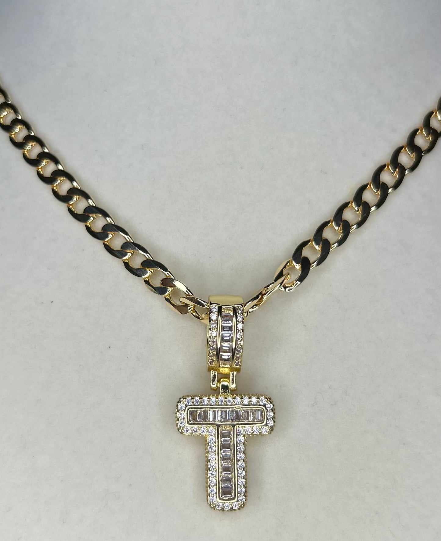 Thick Cuban necklace with initial T.