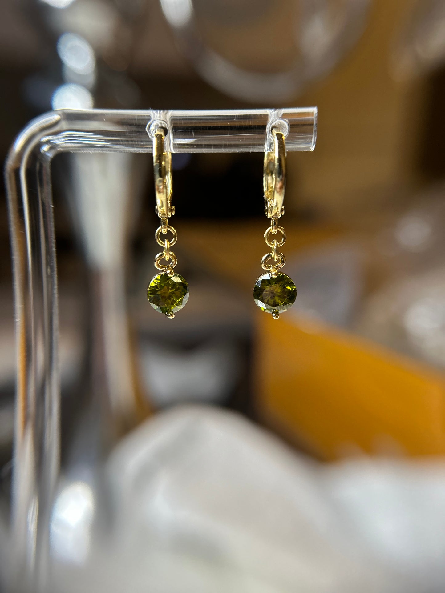 Green dangling earrings