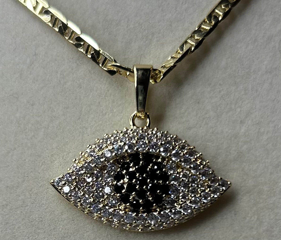 Black eye pendant with GG necklace