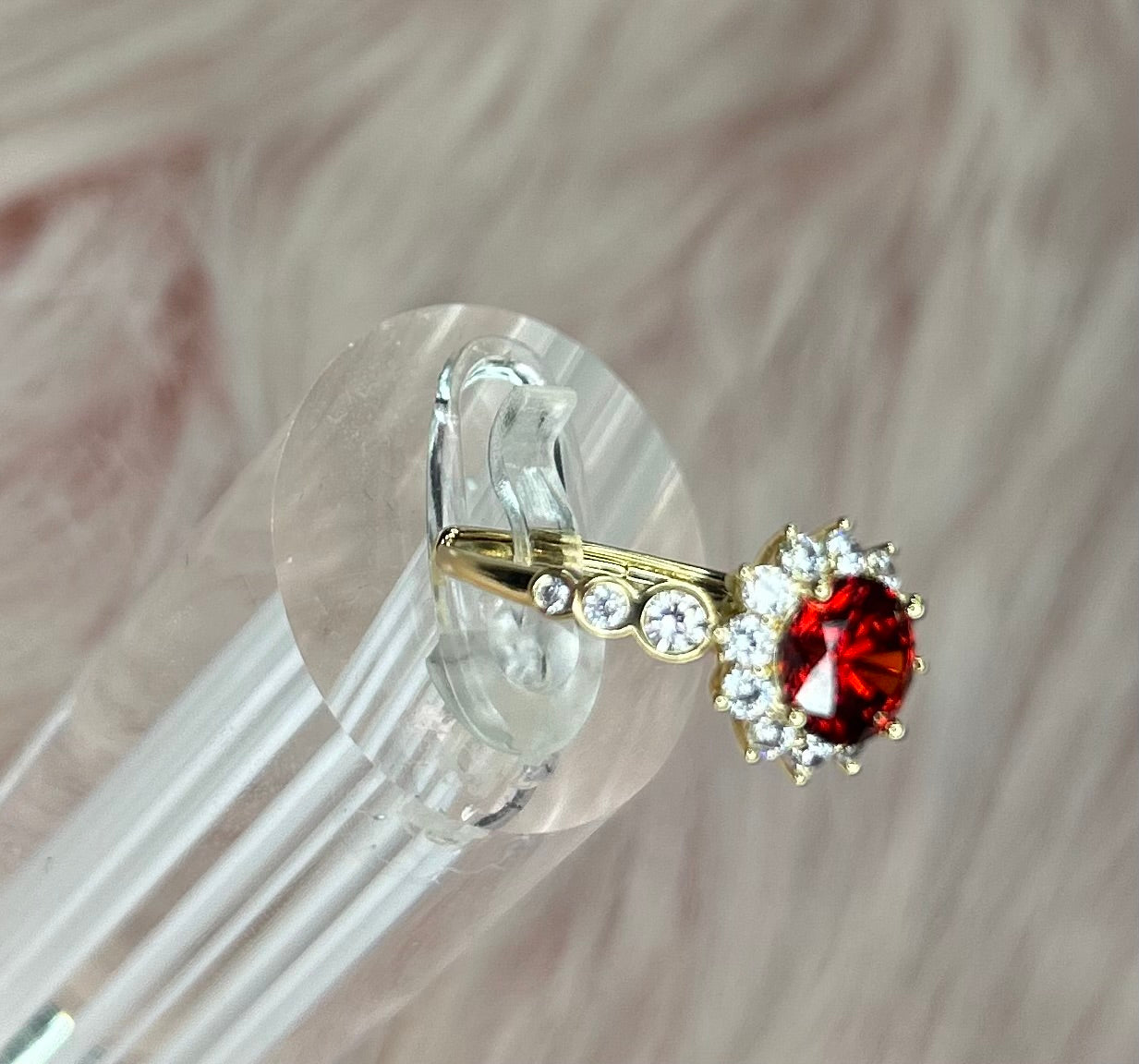 Red adjustable ring