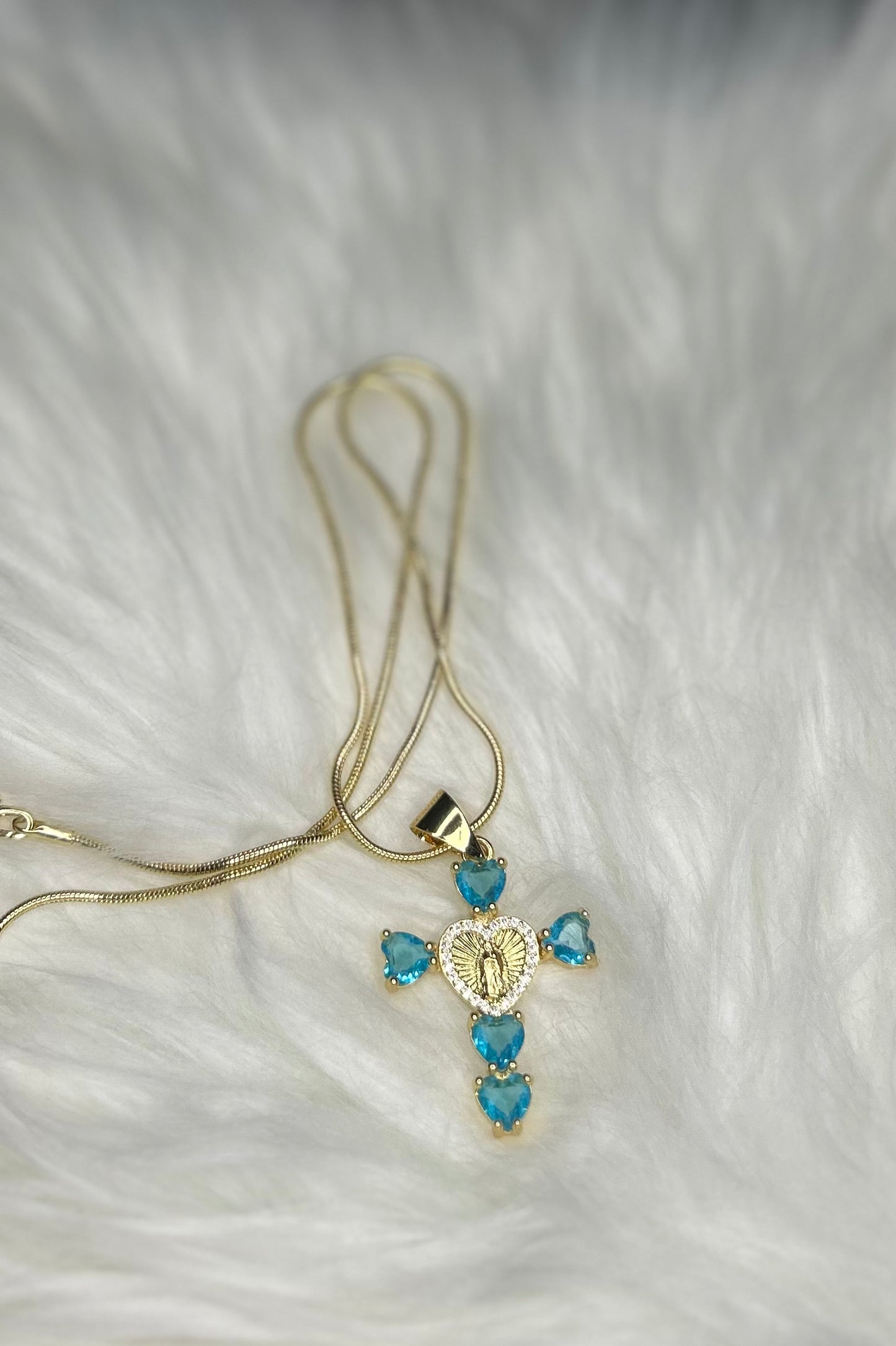 Teal heart cross