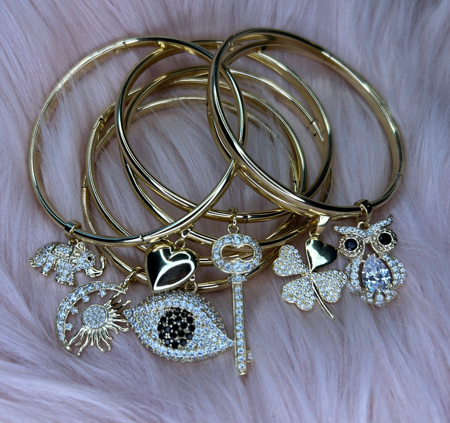 7 bangles with pendants included