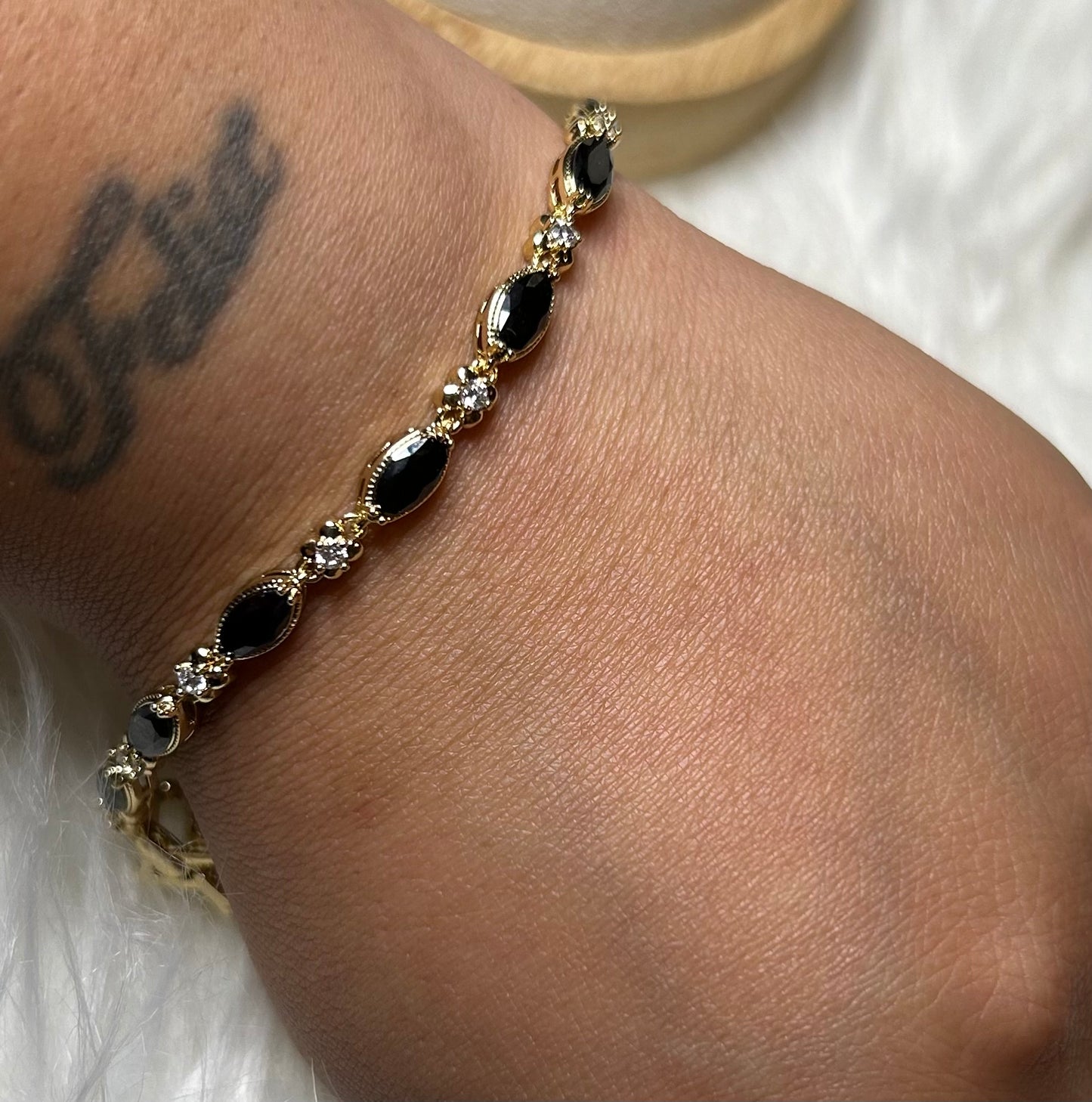 Black and gold bracelet